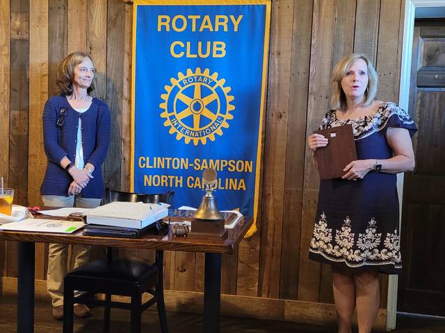 Clinton-Sampson Rotary member and Rotary District Governor nominee designate Nancy Carr, right, presents outgoing president Eileen Coite with a plaque thanking her for doing an amazing job under immense pressure.
                                 Sherry Matthews|Sampson Independent
