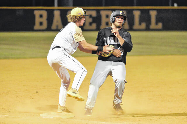 130590398_web1_D4S_5401
Dark Horse third baseman meets a Fairmont base runner well in advance of the bag to record the final out of Fridays 21-4 rout of the Golden Tornadoes.
Mike Carter|For the Independent
