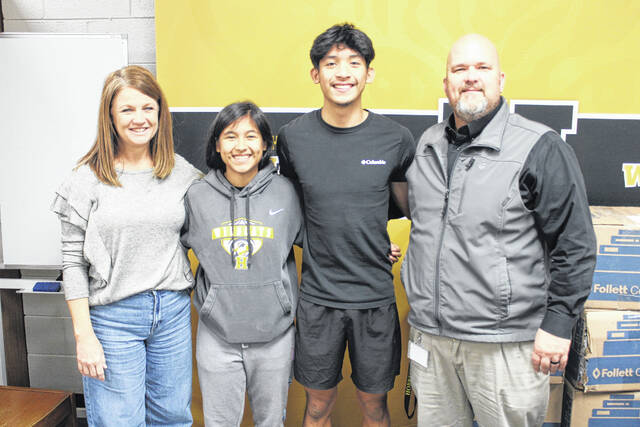 131137256_web1_IMG_3467
Pictured, from left, are Carla Sutton, Denisse Jorge, Henry Jorge and Hobbton Principal Michael Warren. The Jorge siblings mother, Sonia Garcia, was one of many within the community and beyond who helped raise money to purchase caps and gowns for seniors at Mitchell High, many of them whose families lost everything during Hurricane Helene.
Michael B. Hardison | Sampson Independent