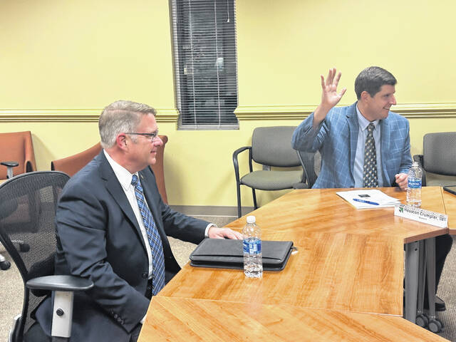 131153792_web1_IMG_1007
Commissioner Chip Crumpler, far right, casts his vote to approve Jeffrey Hudson, at left, as full-time interim county manager. Hudson will take the helm starting on Jan. 21, 2025. The vote to hire him was unanimous.