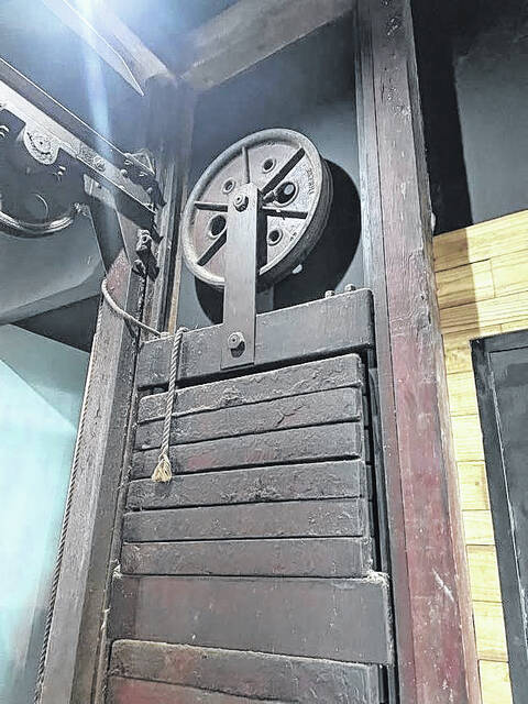 131363320_web1_elevator
A car elevator from the 1920s is a prominent feature inside the new restaurant and taproom.
Suryah Ethridge | Sampson Independent