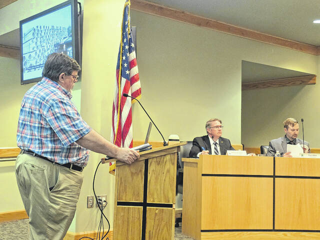 131424688_web1_Ivanhoe-water
Mark Turlington, Sampson County public works director, updates county commissioners on the Ivanhoe water project as a brief video playing in the background shows pipe that awaits putting in the ground. Turlington said work was underway but stressed that the project would take time to complete.