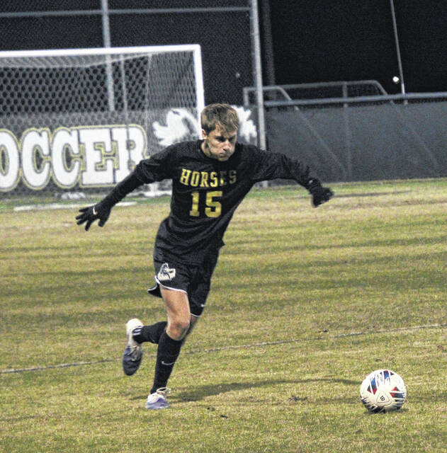 Senior defender Cullen Brewer clears the ball from danger during Clintons shutout win Monday night.