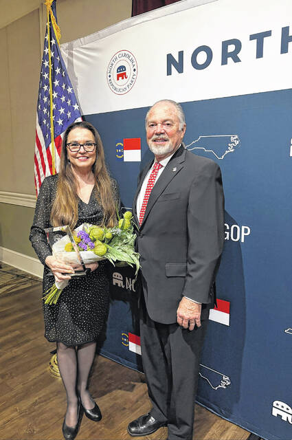 Former Sampson County Republican chairwoman Telia Kivett was inducted into the state GOP Hall of Fame Saturday, Nov. 8, an honor and a surprise, she said. According to a program about the Hall of Fame, organizers and Party officials noted that each nominee and inductee has demonstrated exceptional commitment to the GOP cause  going above and beyond in their service to the Party and their communities. Their steadfast support of the NCGOP and their work behind the scenes have laid the foundation for our Partys continued growth and success. Simply put, the victories weve achieved and the victories yet to come would not be possible without their energy, dedication and service. Kivett, current chairwoman of the GOP 7th Congressional District, has held numerous positions in the GOP ranks, including assistant secretary and secretary to NCGOP State Convention, elector for the Trump inauguration, delegate to the last three national conventions, delegate to the last eight NC conventions and chairwoman of the Sampson Republican Party for eight years. This is her second term as leader of the 7th Distrist. Pictured presenting Kivett the Hall of Fame honor is Susan Mills, past vice chairwoman of the NCGOP and current NCGOP secretary. Also pictured with Kivett is her husband, former Sampson County Commissioners Chairman Jerol Kivett.