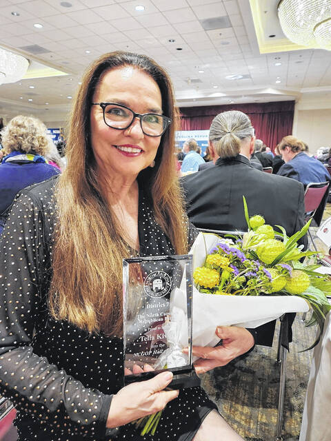 Former Sampson County Republican chairwoman Telia Kivett was inducted into the state GOP Hall of Fame Saturday, Nov. 8, an honor and a surprise, she said. According to a program about the Hall of Fame, organizers and Party officials noted that each nominee and inductee has demonstrated exceptional commitment to the GOP cause  going above and beyond in their service to the Party and their communities. Their steadfast support of the NCGOP and their work behind the scenes have laid the foundation for our Partys continued growth and success. Simply put, the victories weve achieved and the victories yet to come would not be possible without their energy, dedication and service. Kivett, current chairwoman of the GOP 7th Congressional District, has held numerous positions in the GOP ranks, including assistant secretary and secretary to NCGOP State Convention, elector for the Trump inauguration, delegate to the last three national conventions, delegate to the last eight NC conventions and chairwoman of the Sampson Republican Party for eight years. This is her second term as leader of the 7th Distrist. Pictured presenting Kivett the Hall of Fame honor is Susan Mills, past vice chairwoman of the NCGOP and current NCGOP secretary. Also pictured with Kivett is her husband, former Sampson County Commissioners Chairman Jerol Kivett.