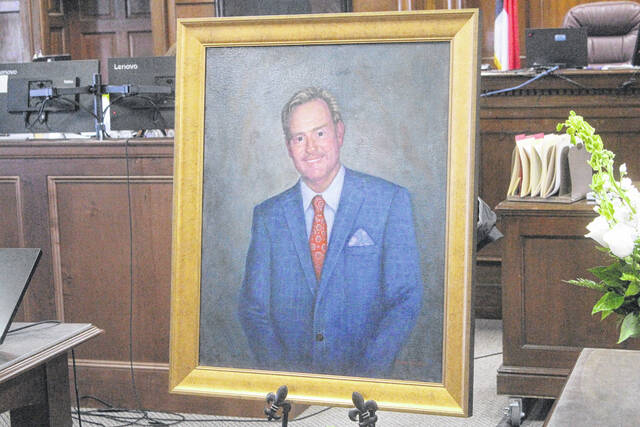 The newly finished portait of the late Ross Holland will soon grace the walls of the Sampson County Courthouse.
                                 Photos by Noah Britt | Sampson Independent