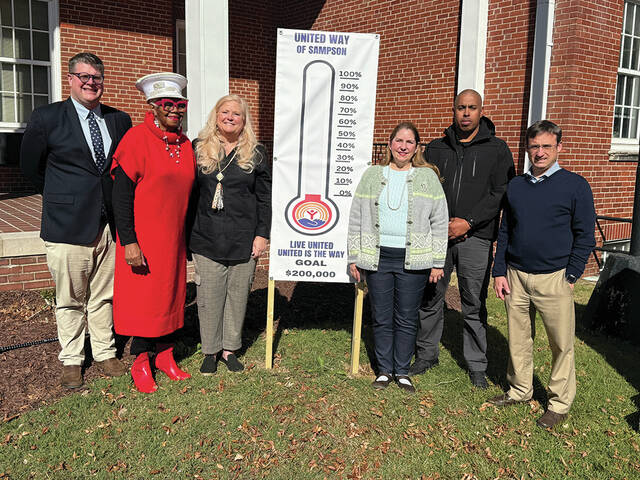 The United Way of Sampson County has kicked off its fundraising campaign for 2026. Pictured, l-r: Clinton City Manager JP Duncan, Patty P. Cherry, Janelle Strickland, United Way of Sampson County Executive Director Linda Jewell Carr, Clinton Police Chief Adrian Mathews and Treasurer Matt Robinson. 
                                 Trevon McGlone | Sampson Independent