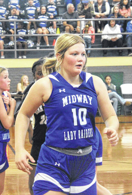 Midway Middle Lady Raider Cate Williams prepares herself for an incoming inbound play.