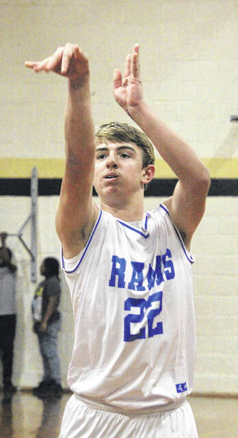 Dark Horse Hampton Bass follows through his shot, putting his team up early in the first half.