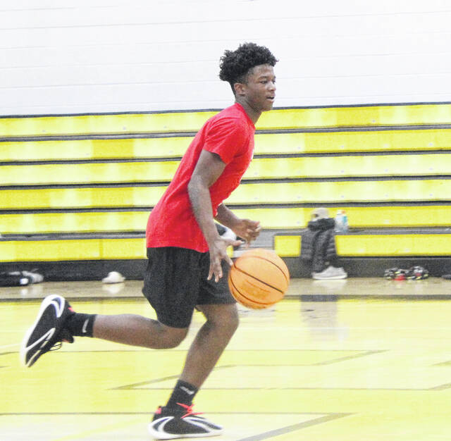 Returning guard Amir Tate, seen here at an early practice, looks to continue his success on varsity, and embracing more of a leadership role on the team.