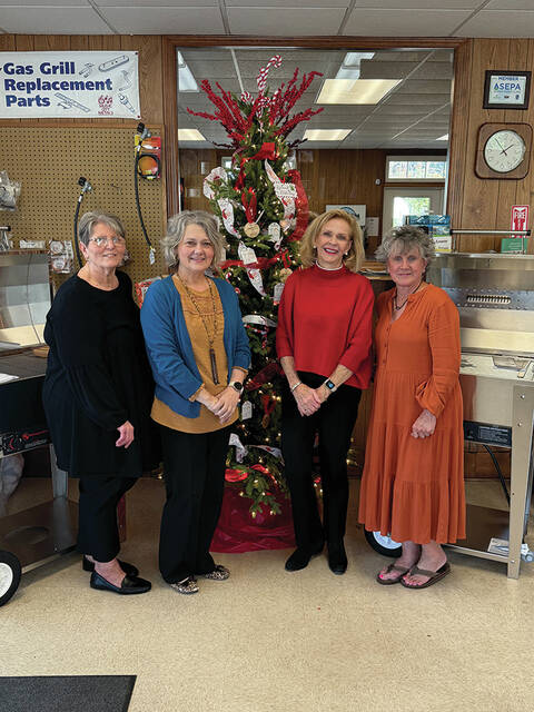Williamson Gas employees, from left, Gayla Grantham, Angela Walton (also the founder of Harbor of Grace), Connie Williamson, owner, and Lynette Honeycutt.
                                 Trevon McGlone| Sampson Independent