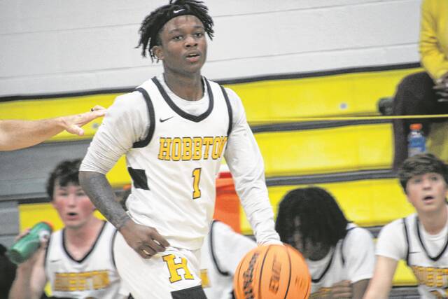Hobbtons Amir Tate advances into scoring position as the first half winds down.