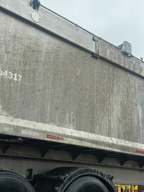 Animal waste from this truck, owned by J.B. Hunt Transport Services Inc., spilled onto the roadway near the intersection of US 421 and North Boulevard Friday morning.
                                 Courtesy photos | Clinton PD