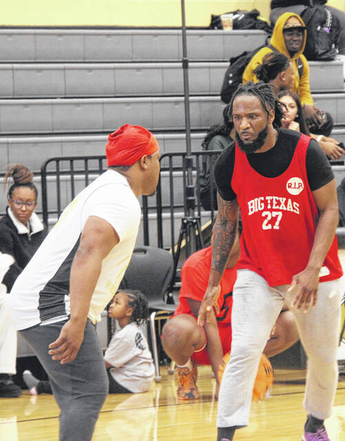 Larry Booma George, graduate of Union, stares down his defender before making his move.