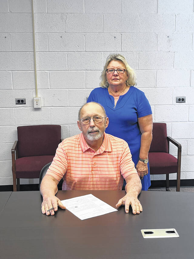 G.H. Wilson, seen here with wife Kathy when he filed to run for another term on the Sampson County Board of Education, was injured last week in a two-vehicle accident in northern Sampson.