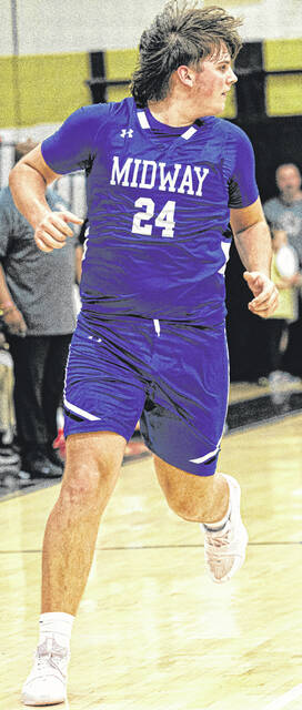 Midway center Harry Johnson running the floor on a fast-break opportunity for the Raiders.