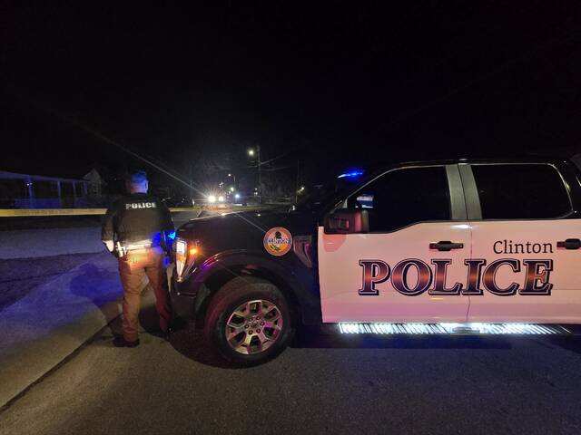 Yellow crime scene tape and a Clinton police cruiser blocked a portion of Williams Street where officers were Monday night around 7 p.m., searching for bullet casings.