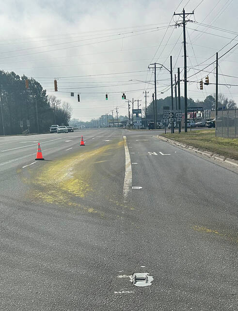 An unidentified substance littered the roadway near the intersection of Southeast and Martin Luther King Boulevards in Clinton on Tuesday morning.
                                 Abby Cavenaugh | Sampson Independent