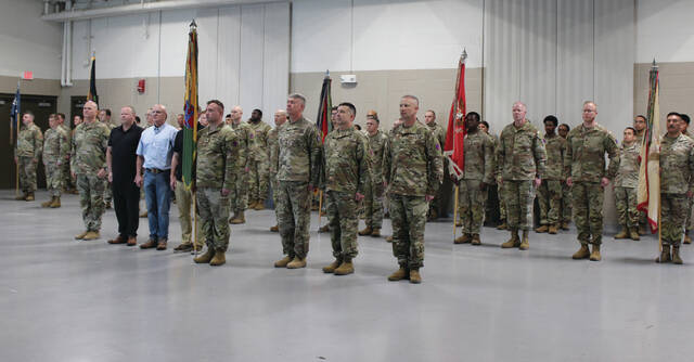 National Guardsmen stand at attention during the Change of Command and Reflagging Ceremony Saturday morning at the Clinton Armory.
                                 Photos by Abby Cavenaugh | Sampson Independent