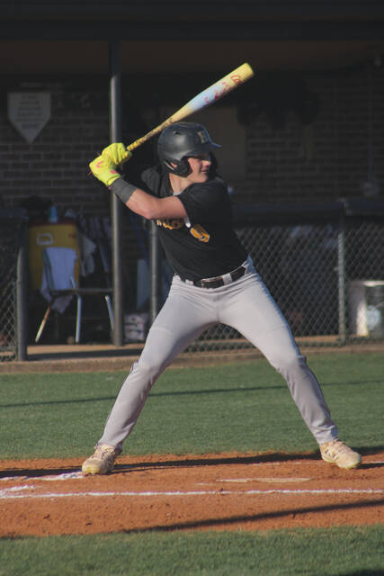 Hobbton sophomore Thomas Tart winds up awaiting an incoming pitch.