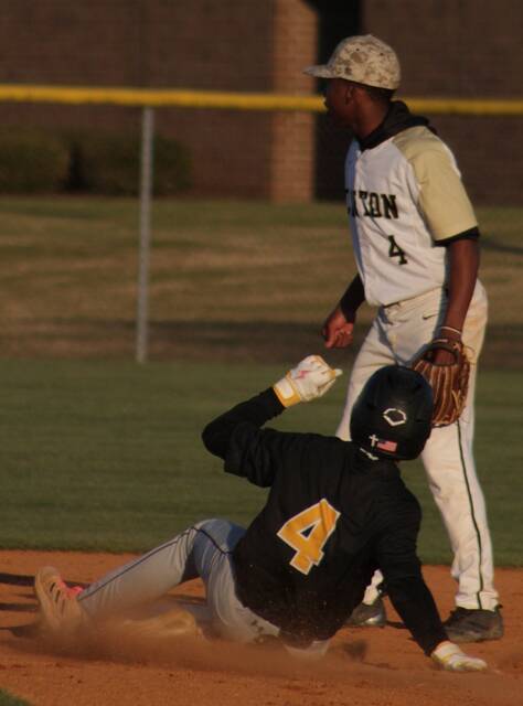 Junior Wildcat Ayden Lawson slides into second during Wednesdays contest covered by Clintons Anayhs Butler.