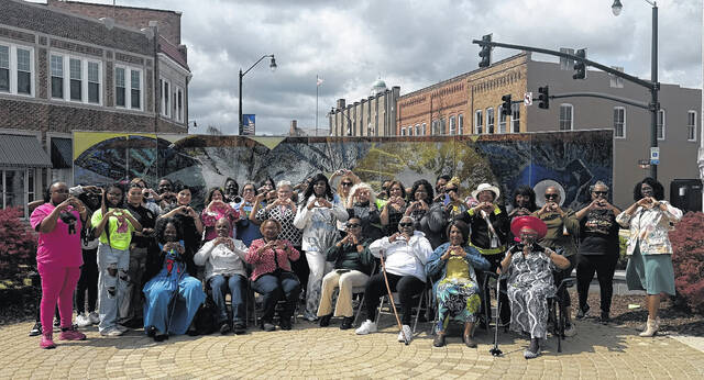 A community photo of every woman that attended the fourth annual Sampson Womens Day Celebration on Thursday.
Trevon McGlone| Sampson Independent