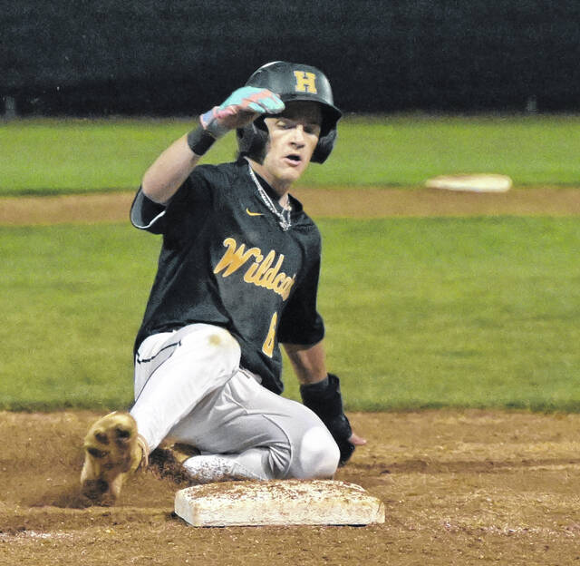 Sophomore Wildcat Braxton McLamb slides safely into third base.