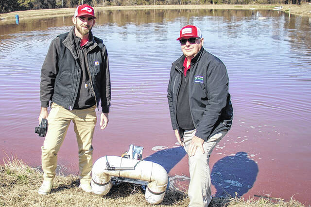 Curtis Barwick, right, along with his son Graylon, created an app for farmers to use to keep track of their lagoons and other aspects of swine farming. Curtis Barwick won the Lois G. Britt Service Award from the N.C. Pork Council.
                                 Courtesy photos | N.C. Pork Council