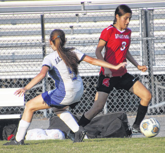 Union sophomore Evelin Alverez uses her dribbling skills to break past a Lady Eagle defender.
