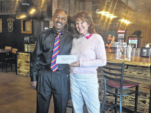 Clinton-Sampson Rotary Club President Thaddeus Godwin recently presented Lisa Turlington, director of advancement at Sampson Community College, with a $1,000 check, funds that will be used for a student scholarship. The noon-day club has provided the scholarships funds for years now, and Turlington told members it makes an impact on the community and especially the recipient.