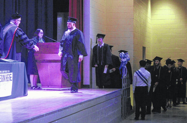 Sampson Community College graduates walk the stage at the Sampson Agri-Exposition Center Thursday night, securing their degrees turning their tassels as graduates. SCCs Class of 2026 is the first of many senior classes graduating in Sampson County this month.