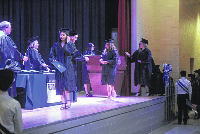 Sampson Community College graduates walk the stage at the Sampson Agri-Exposition Center Thursday night, securing their degrees turning their tassels as graduates. SCCs Class of 2026 is the first of many senior classes graduating in Sampson County this month.