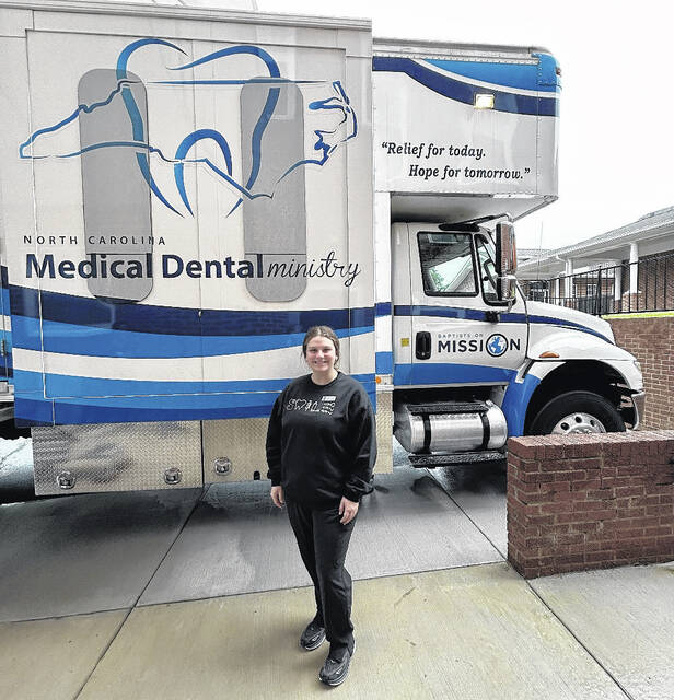 Clinton resident and ECU student Lensey Cabral stands in front of the Baptist on Mission mobile dental bus, where she recently worked, assisting local residents with some of their dental needs.
Courtsey Photos from Lensey Cabral