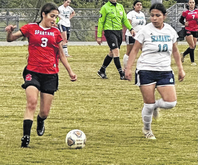 Union sophomore Evelin Alverez navigates through traffic using her dribbling.