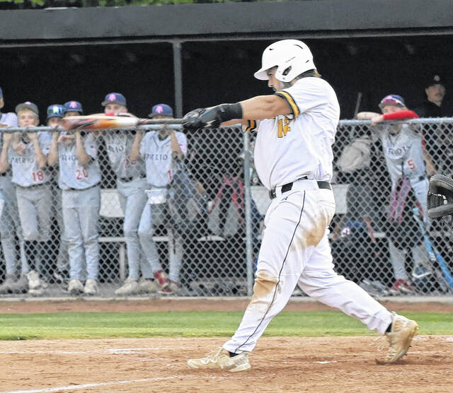 Hobbton senior Kasey Lee connects for a double that nearly clears the fence.