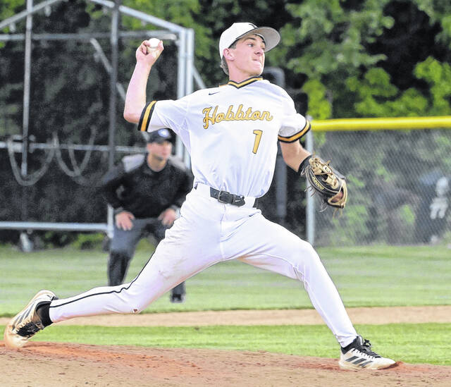 Senior Wildcat Lathan Warren closes the win, throwing his final pitch at Hobbton.