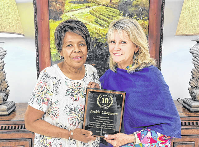 Jackie Chapman, a 10-year volunteer at Sampson Regional, is pictured with Judy Naylor, director of Volunteer Services at SRMC. (Courtesy photo|SRMC)