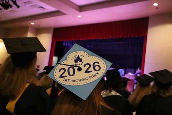 The graduate cap says it all.