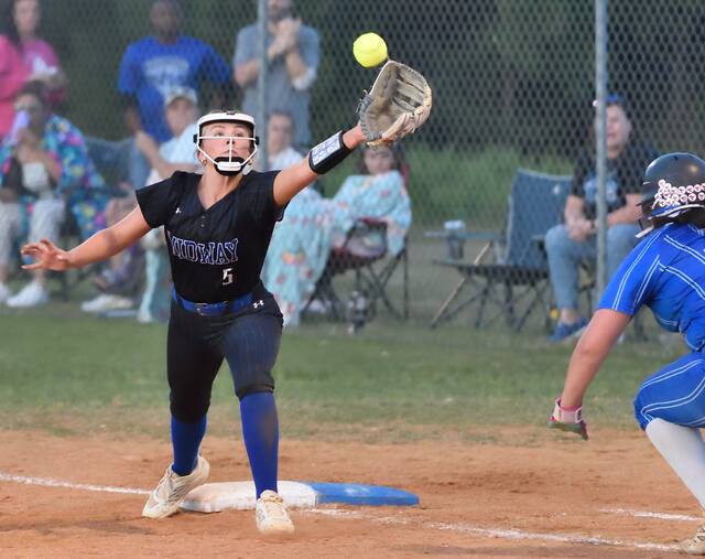 Midway junior Lauralee Harris stretches for a throw during fifth inning action.