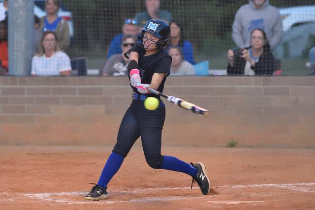 Midway outfielder Macy Raynor connects in the bottom of the sixth for a triple. She was later driven in by a sacrifice fly by Ella Clark.