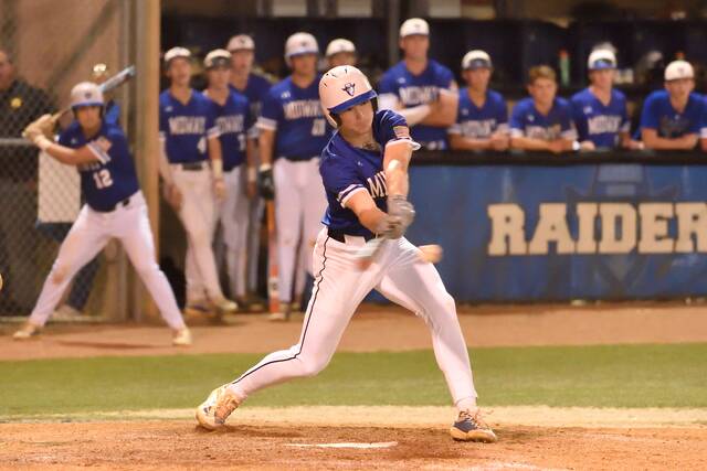 Midways Wesley Tew makes contact for the game-winning hit with a walkoff single.