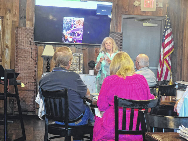 Mary Ann Styons delights members of the Clinton-Sampson Rotary Club with her enthusiastic presentation on her recent visit to India, where Rotarians worked to give Oral Polio Vaccine (OPV) to children. Styons said the trip inspired her to join the local Jacksonville Rotary Club. I just love what the club stands for, all of Rotary, and I love those who are Rotarians. Yall are good people, she told the assembled group at heir noon-day meeting.