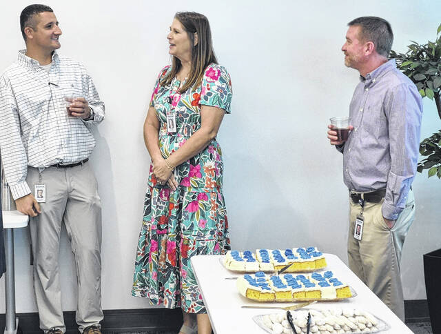 Monday night, Star Communications staff hosted the first Business After Hours the Clinton-Sampson Chamber of Commerce has held since before the COVID-19 pandemic. The event, held at Stars headquarters on Sunset Avenue, was designed to give local business leaders a chance to network in a relaxed environment. Pictured, from left, Katie Smith speaks with Stars Ron Carter during the Tuesday event.