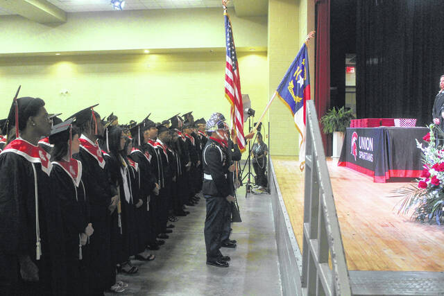 The Union High JROTC posts the colors at the beginning of the graduation ceremony Friday.