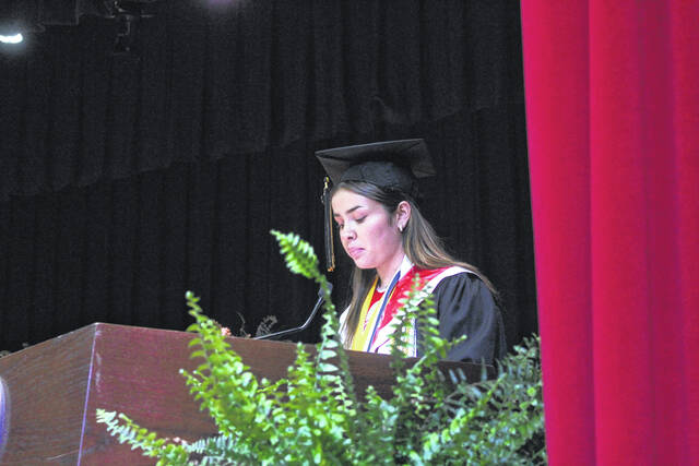 Union High salutatorian Leslie Solorzano-Benitez makes her address to her classmates Friday afternoon during graduation ceremonies at the Agri-Exposition Center in Clinton.