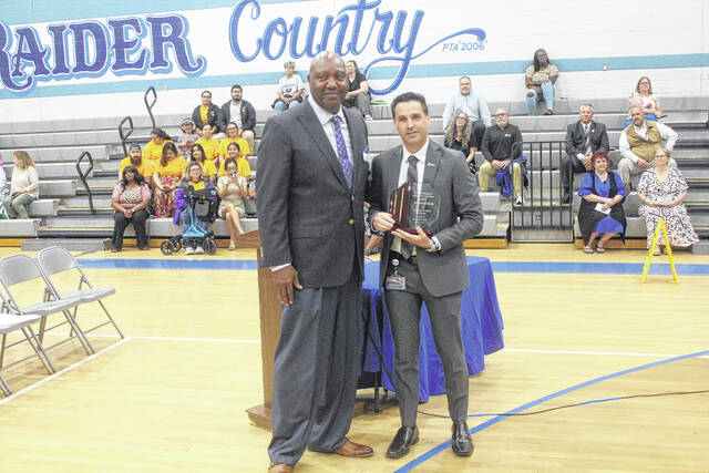 Sampson County Schools Superintendent Dr. Jamie King was recognized by Dr. Ron Hargrave from the Sandhills Regional Consortium as the Sandhills Regional Superintendent of the Year
