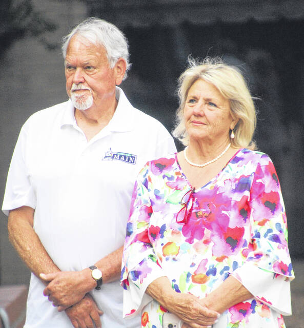 Stan and Debbie Roberts soak in the moment as Main Street director Tyler Wise begins the opening comments at Dinner on Main.
                                 A. Goodman | Sampson Independent