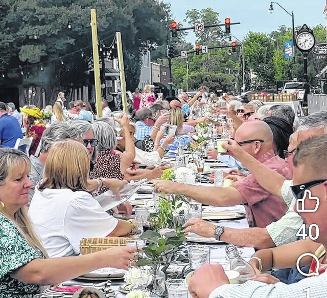 The evening began with a table toast, and a nod to community. (Courtesy photo)