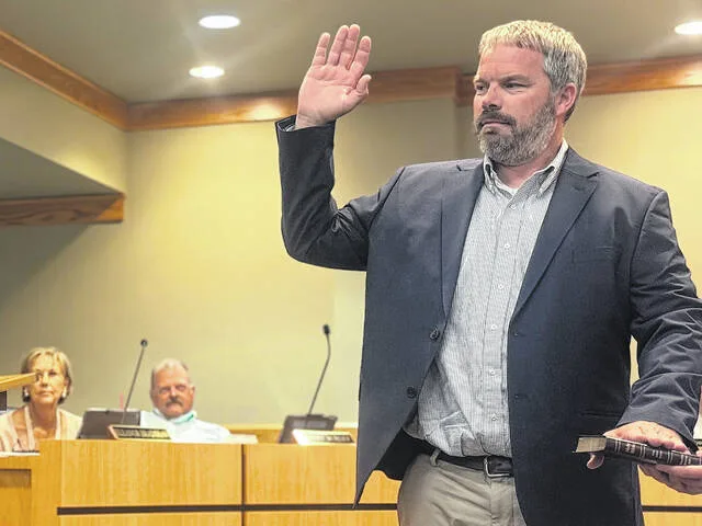 Sampson County Board of Education Chair Daryll Warren takes his oath, returning him to the board for a third term.