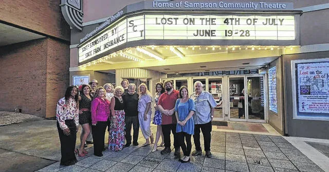 The cast and directors of Lost on the 4th of July poise for a photo outside the Sampson Community Theatre on Fayetteville Street after opening night. They are pictured alongside the shows playwright, Rick Harlowe, and his wife, Leah Weaver Harlowe. The final two performances will be this evening at 7 p.m. and Sunday afternoon at 2 p.m. Tickets can be purchased at the door.
Courtesy Photo | Leah Weaver Harlowe